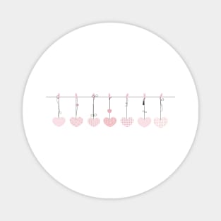 It's a girl hanging pink hearts Magnet
